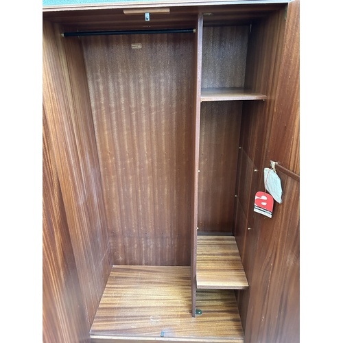 7 - An Austinsuite teak double wardrobe - approx. 174cm high x 92cm wide x 58cm deep