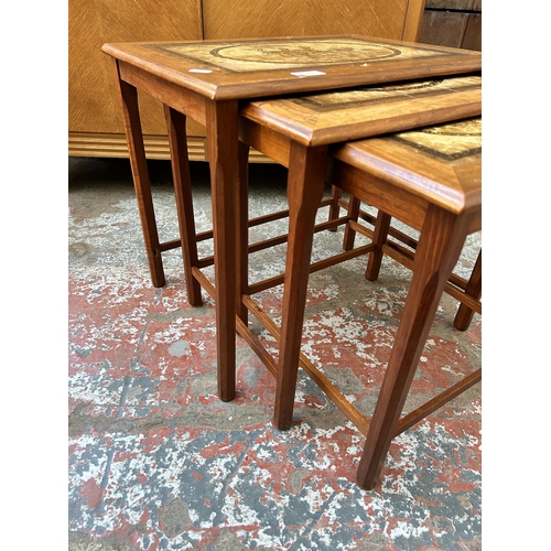 93 - A mid 20th century Mobelfabrikken Toften of Denmark teak and tile top nest of three tables