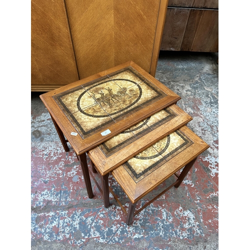 93 - A mid 20th century Mobelfabrikken Toften of Denmark teak and tile top nest of three tables