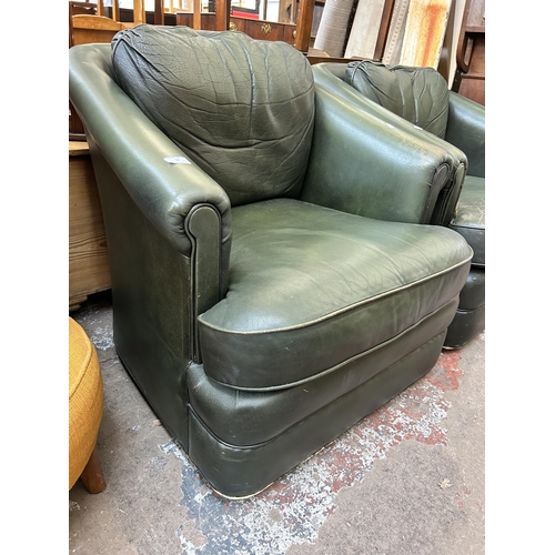 99 - A pair of Pendragon green leather armchairs