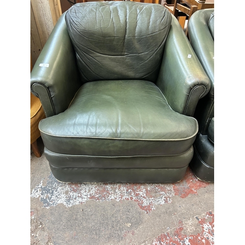 99 - A pair of Pendragon green leather armchairs