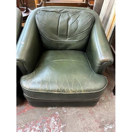 99 - A pair of Pendragon green leather armchairs