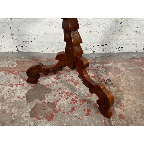 114 - A 19th century style carved mahogany tripod occasional table - approx. 91cm high