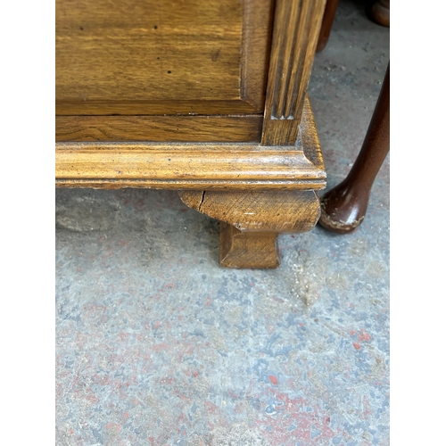 178 - An Edwardian Ralph Johnson Warrington carved oak bureau