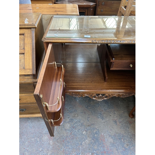 179 - A walnut cocktail cabinet with fitted interior and cabriole supports - approx. 99cm high x 89cm wide... 