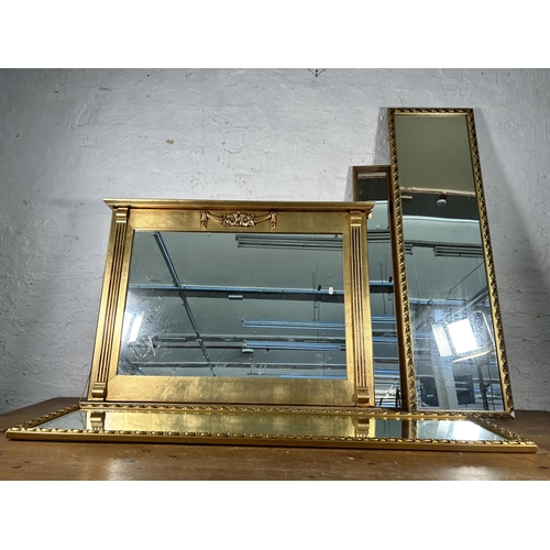 225 - Four gilt framed wall mirrors - largest approx. 76cm high x 102cm wide