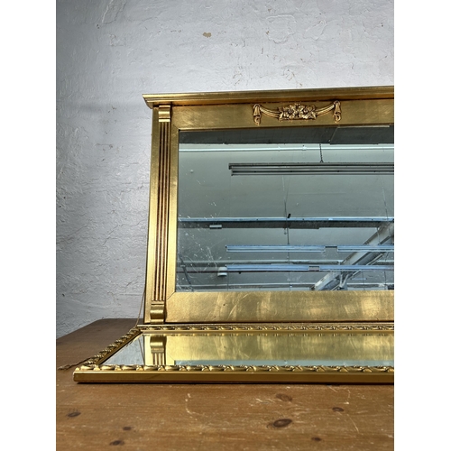 225 - Four gilt framed wall mirrors - largest approx. 76cm high x 102cm wide