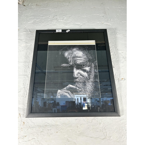 303 - A framed portrait print of an elderly gentleman - approx. 56cm high x 49cm wide