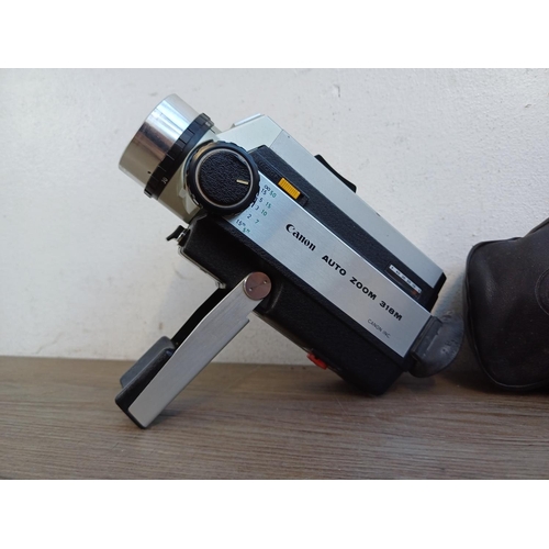 642 - A cased early 1970s Canon Auto Zoom 318M Super8 cine camera