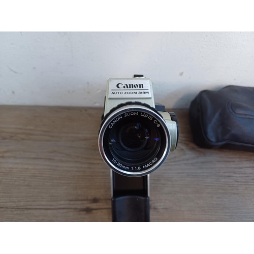 642 - A cased early 1970s Canon Auto Zoom 318M Super8 cine camera