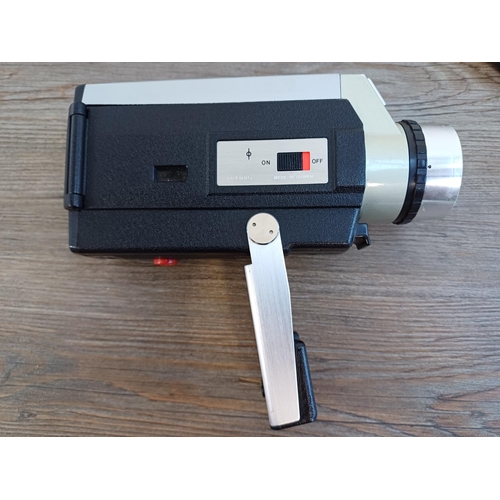 642 - A cased early 1970s Canon Auto Zoom 318M Super8 cine camera