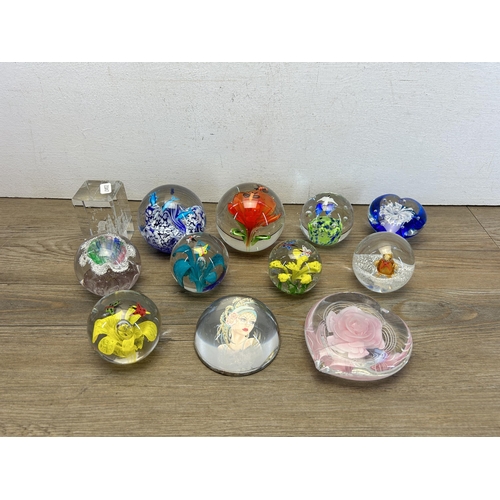 343 - Twelve art glass paperweights