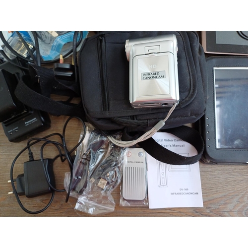 668 - Five items, one cased Samsung GT-N8010 tablet, one Asus TF101 tablet, one cased Panasonic NV-S70B SV... 
