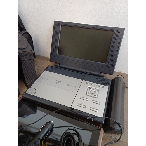 668 - Five items, one cased Samsung GT-N8010 tablet, one Asus TF101 tablet, one cased Panasonic NV-S70B SV... 