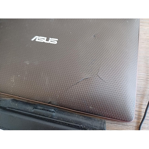 668 - Five items, one cased Samsung GT-N8010 tablet, one Asus TF101 tablet, one cased Panasonic NV-S70B SV... 