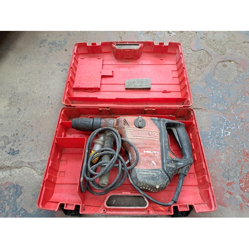 A cased Hilti TE65 110v hammer drill