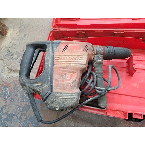 A cased Hilti TE65 110v hammer drill