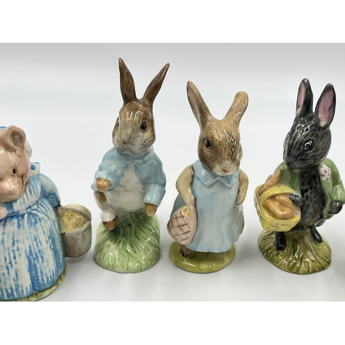 307 - Seven Beatrix Potter figurines, four Royal Albert and three Beswick