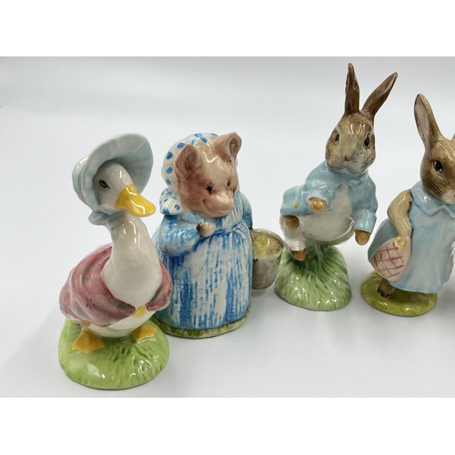 307 - Seven Beatrix Potter figurines, four Royal Albert and three Beswick