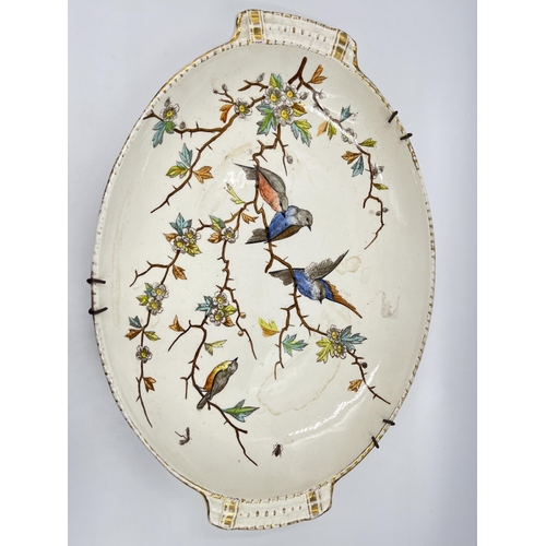 318 - A Franz Anton Melham for Royal Bonn porcelain twin handled oval dish depicting birds - approx. 34cm ... 