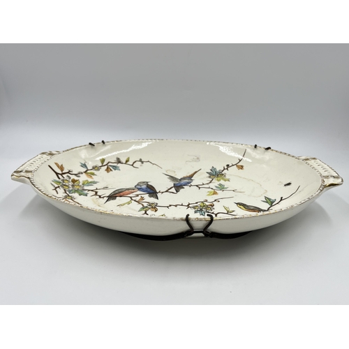 318 - A Franz Anton Melham for Royal Bonn porcelain twin handled oval dish depicting birds - approx. 34cm ... 