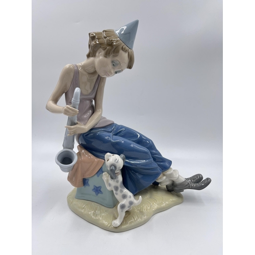 320 - A Lladro no. 5059 Clown with Saxophone figurine - approx. 25cm high