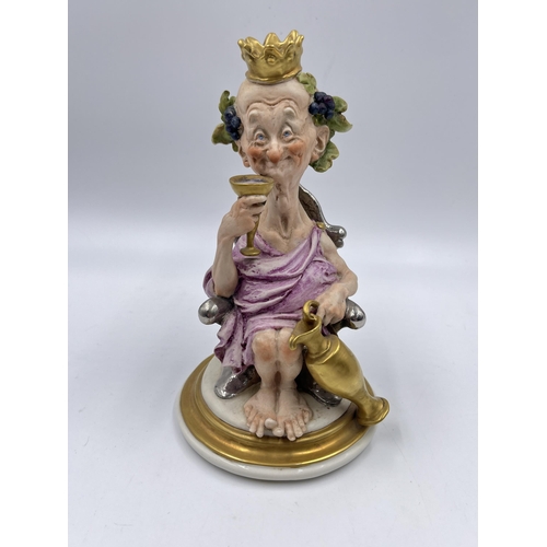 323 - A Capodimonte porcelain figurine by G. Calle - approx. 18cm high