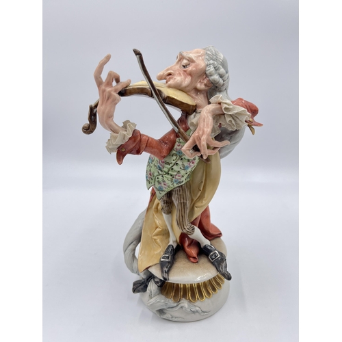 324 - A Capodimonte Grotesque Violin Player porcelain figurine, by Giuseppe Cappe - approx. 22cm high