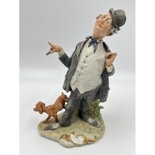 325 - A Capodimonte porcelain figurine of a man and dog by G. Calle - approx. 22cm high