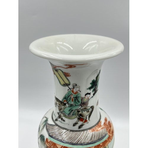 328 - A Chinese Famille Verte porcelain baluster vase - approx. 29cm high