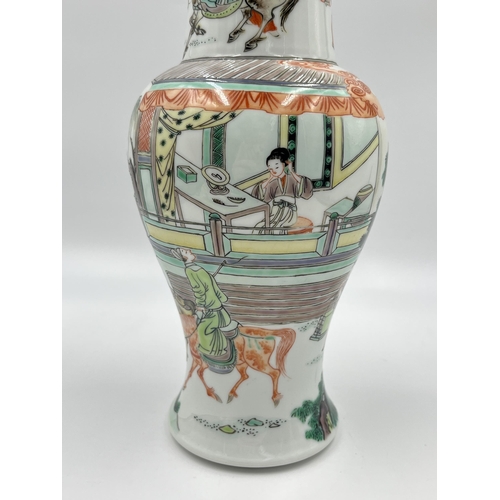 328 - A Chinese Famille Verte porcelain baluster vase - approx. 29cm high