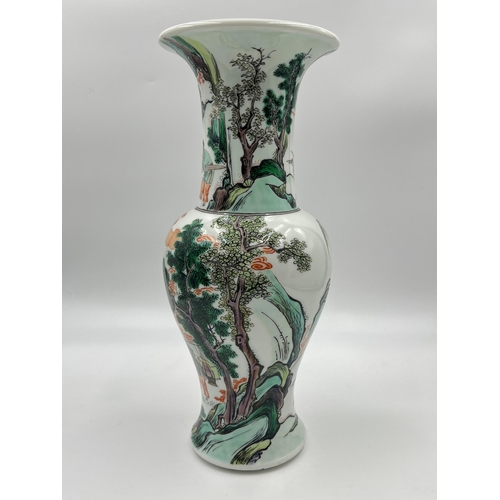 328 - A Chinese Famille Verte porcelain baluster vase - approx. 29cm high