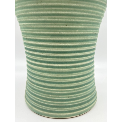 334 - An Art Deco Lovatts England green ribbed stoneware vase - approx. 25cm high