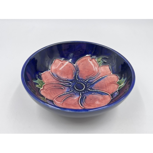 335 - A Moorcroft Anemone pattern circular trinket dish - approx. 12cm diameter