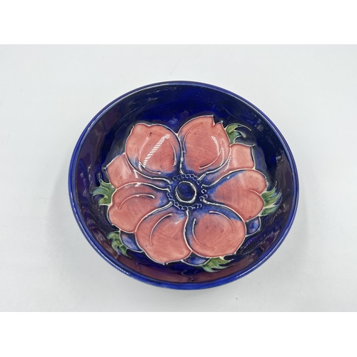 335 - A Moorcroft Anemone pattern circular trinket dish - approx. 12cm diameter