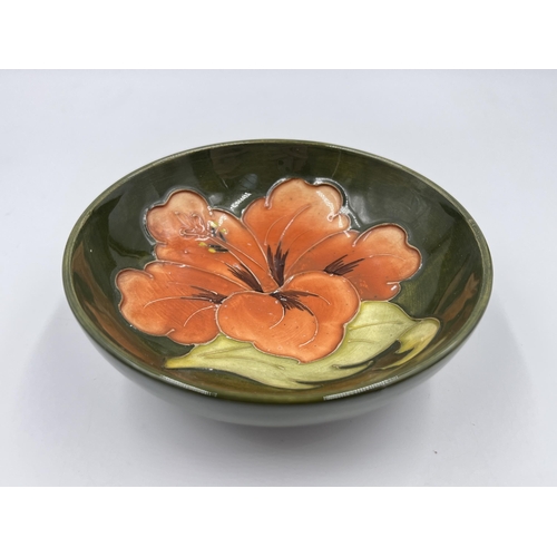 336 - A Moorcroft Coral Hibiscus circular trinket dish - approx. 12cm diameter