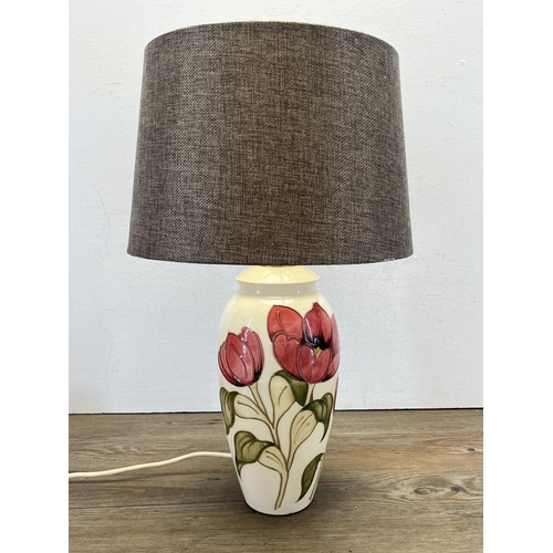 338 - A Moorcroft Pink Tulip on Ivory table lamp - approx. 33cm high