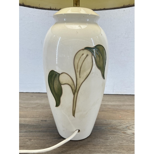 338 - A Moorcroft Pink Tulip on Ivory table lamp - approx. 33cm high