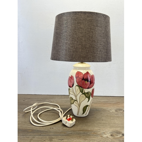 338 - A Moorcroft Pink Tulip on Ivory table lamp - approx. 33cm high