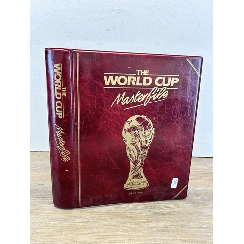 548 - A 1974 The World Cup Album containing Mexico 1986 World Cup Official commemorative First Day Covers