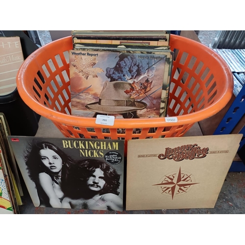 701 - A collection of LPs to include Buckingham/Nicks, Jimmy Buffett, Weather Report, U2, Santana, Joni Mi... 