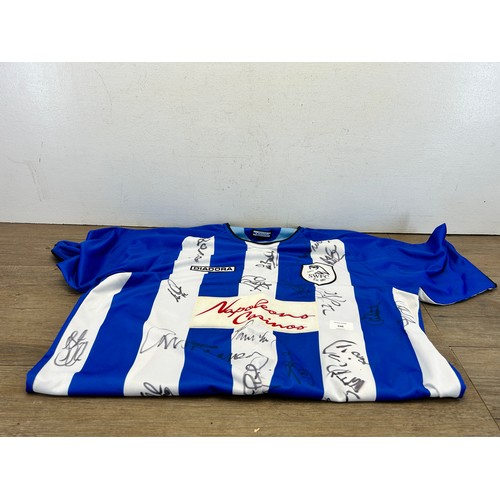 546 - A signed Sheffield Wednesday FC size L shirt