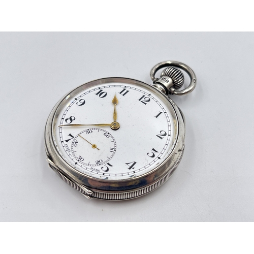 2228 - A George V hallmarked Birmingham silver cased open face hand wind pocket watch, dated 1935