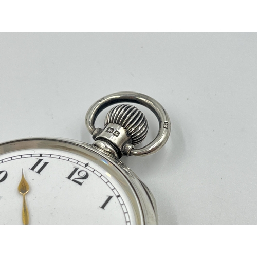 2228 - A George V hallmarked Birmingham silver cased open face hand wind pocket watch, dated 1935