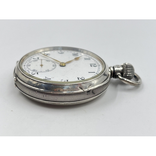 2228 - A George V hallmarked Birmingham silver cased open face hand wind pocket watch, dated 1935