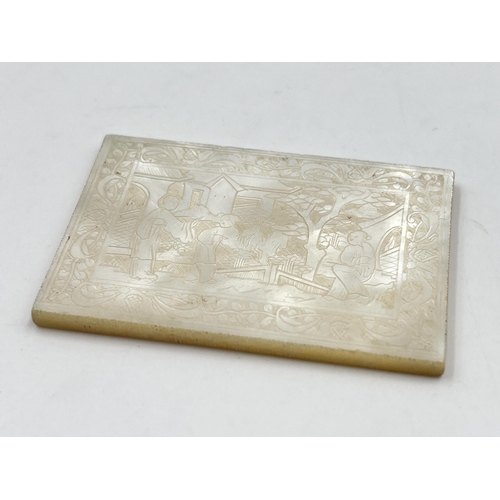 2329 - A Chinese etched mother of pearl plaque - approx. 3.5cm high x 5cm wide