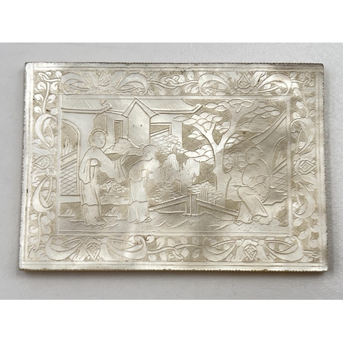 2329 - A Chinese etched mother of pearl plaque - approx. 3.5cm high x 5cm wide