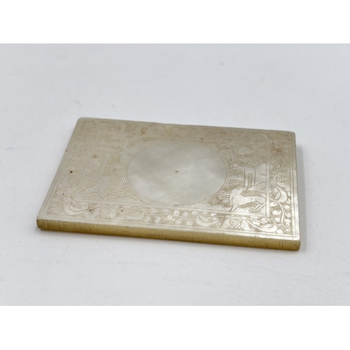 2329 - A Chinese etched mother of pearl plaque - approx. 3.5cm high x 5cm wide