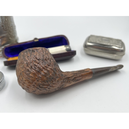 2330 - Five pieces of tobacciana to include Compact smoking pipe, leather cased clay cheroot holder with am... 