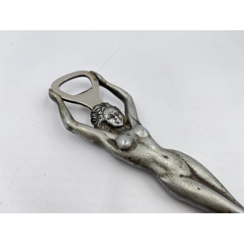 2331 - A mid 20th century Rostfri SMS metal nude lady bottle opener - approx. 21cm long